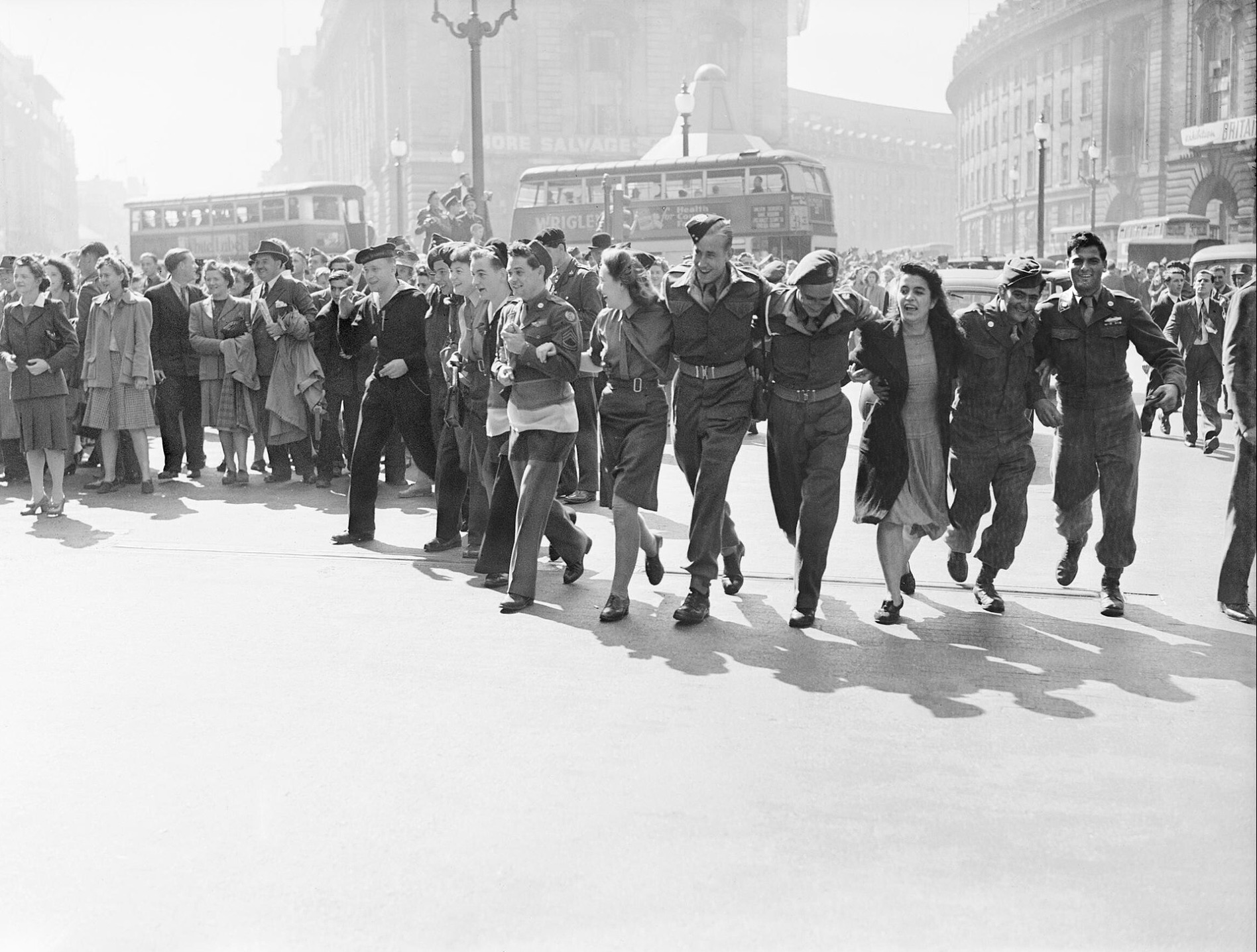 Civilians and service personnel in London celebrating V-J Day. 